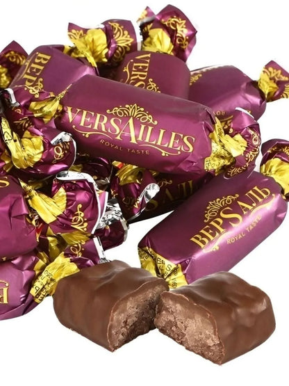「ヴェルサイユ」ココア風味プラリネとクリスピーボール入りチョコ菓子